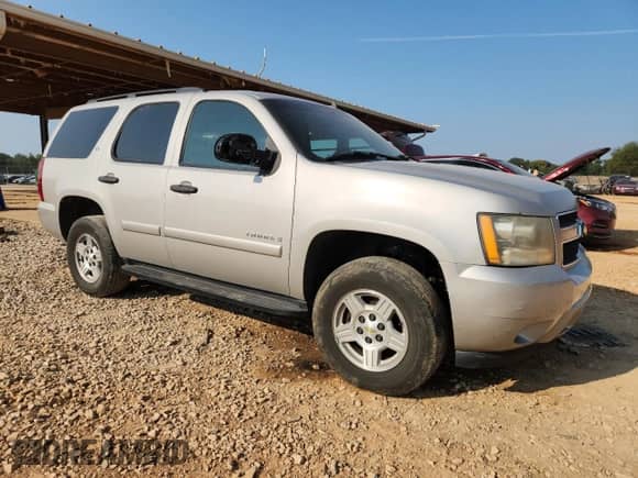 2007 Chevrolet Tahoe LS z VIN 1GNFC13C47J380954, wystawiony jako Copart lot #81503455 z przebiegiem 205 384 mil mil oraz Szkoda całkowita • Salvage title. Historia ofert i sprzedaży dostępna na DreamBid. Obrazek 4.