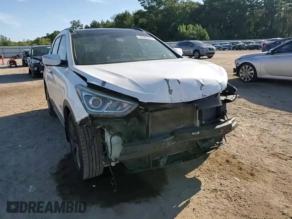 2017 Hyundai Santa Fe Ultimate с VIN 5XYZW4LA5HG453781, выставлен на аукционе Copart как лот 70626395 с пробегом 146 042 миль миль и Списание • Salvage title. История ставок и продаж доступна на DreamBid. Изображение 13.