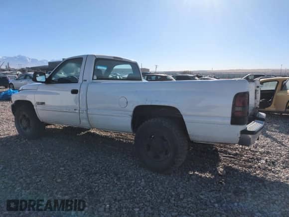 2001 Dodge RAM with VIN 3B7KC26601M283456, listed as a Copart auction lot 41870155 with 243,191 mi miles and Salvage title. Bid and sale history available at DreamBid. Image 2.