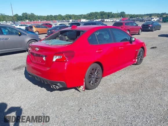 2015 Subaru WRX with VIN JF1VA1A66F9816667, listed as a IAAI auction lot 42983062 with 106,489 mi miles and . Bid and sale history available at DreamBid. Image 4.