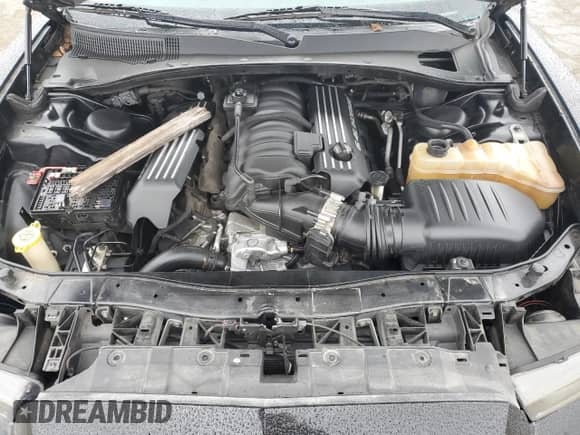 2013 Dodge Charger SRT-8 z VIN 2C3CDXEJXDH566023, wystawiony jako Copart lot #46104785 z przebiegiem 106 651 mil mil oraz Szkoda całkowita • Salvage title. Historia ofert i sprzedaży dostępna na DreamBid. Obrazek 12.