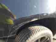 2007 Chevrolet Tahoe LTZ with VIN 1GNFK13027R249676, listed as a IAAI auction lot 43424132 with 296,751 mi miles and . Bid and sale history available at DreamBid. Image 16.