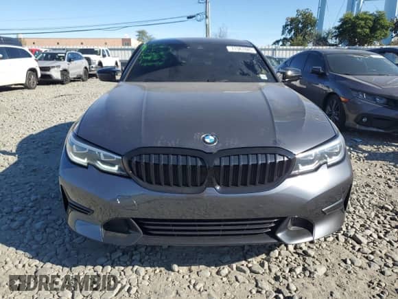 2021 BMW 3 Series 330i xDrive z VIN 3MW5R7J02M8B78049, wystawiony jako Copart lot #71387885 z przebiegiem 36 496 mil mil oraz Szkoda całkowita • Salvage title. Historia ofert i sprzedaży dostępna na DreamBid. Obrazek 5.