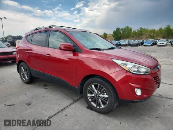 2015 Hyundai Tucson SE with VIN KM8JU3AGXFU046891, listed as a Copart auction lot 68910575 with 72,657 mi miles and Salvage title. Bid and sale history available at DreamBid. Image 4.