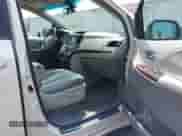 2011 Toyota Sienna XLE AAS with VIN 5TDYK3DCXBS036300, listed as a IAAI auction lot 42783620 with 199,813 mi miles and . Bid and sale history available at DreamBid. Image 5.