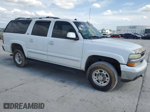 2003 Chevrolet Suburban LT с VIN 3GNGK26G53G153327, выставлен на аукционе Copart как лот 66840735 с пробегом Не указан миль и Списание • Salvage title. История ставок и продаж доступна на DreamBid. Изображение 4.