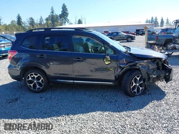 2015 Subaru Forester XT Touring with VIN JF2SJGWC0FH473070, listed as a IAAI auction lot 43024485 with 220,181 mi miles and . Bid and sale history available at DreamBid. Image 13.