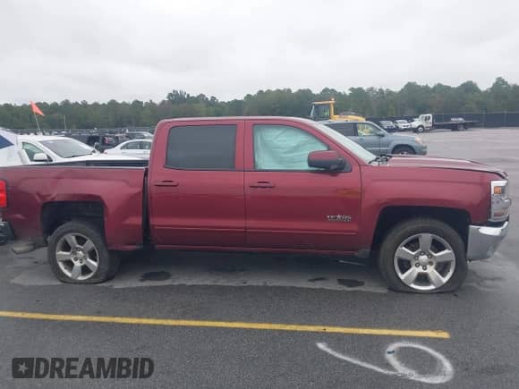 2016 Chevrolet Silverado 1500 LT z VIN 3GCPCRECXGG313494, wystawiony jako IAAI lot #43310056 z przebiegiem 162 696 mil mil oraz . Historia ofert i sprzedaży dostępna na DreamBid. Obrazek 13.