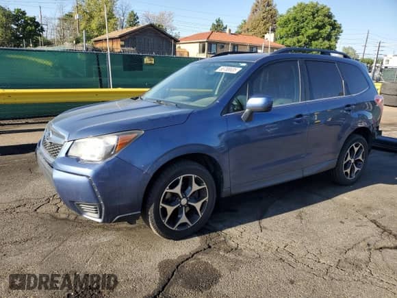 2014 Subaru Forester XT Premium with VIN JF2SJGDC8EH464442, listed as a Copart auction lot 68788635 with 114,539 mi miles and Salvage title. Bid and sale history available at DreamBid. Image 1.