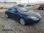 2008 Hyundai Tiburon GT z VIN KMHHN66F38U288082, wystawiony jako Copart lot #64058395 z przebiegiem 162 668 mil mil oraz Szkoda całkowita • Salvage title. Historia ofert i sprzedaży dostępna na DreamBid. Obrazek 4.