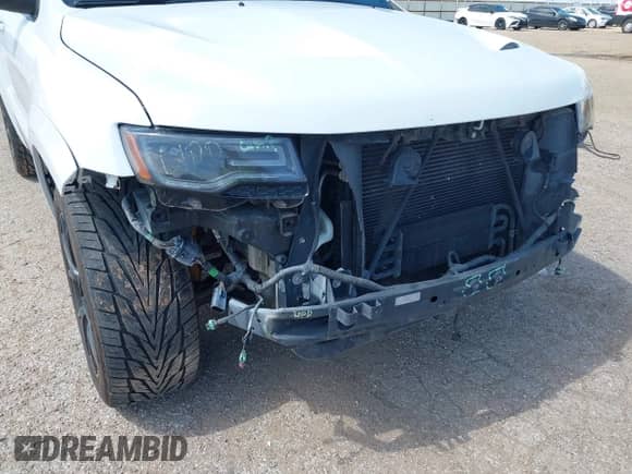 2015 Jeep Grand Cherokee SRT z VIN 1C4RJFDJ4FC182206, wystawiony jako IAAI lot #42431139 z przebiegiem 99 498 mil mil oraz . Historia ofert i sprzedaży dostępna na DreamBid. Obrazek 6.