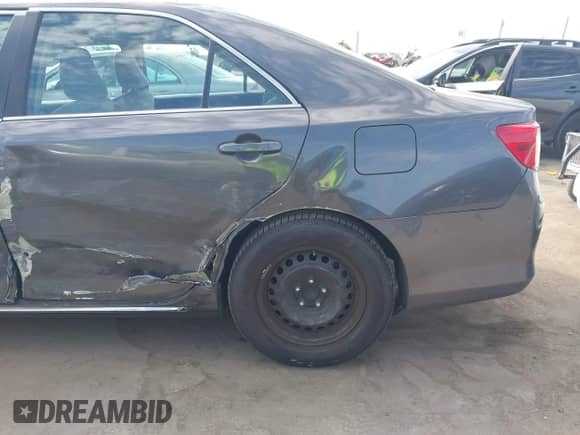 2014 Toyota Camry XLE with VIN 4T4BF1FK4ER441363, listed as a IAAI auction lot 43368571 with 122,544 mi miles and . Bid and sale history available at DreamBid. Image 6.