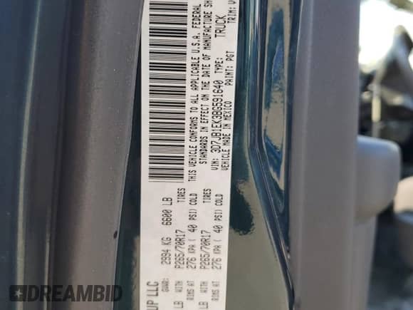 2011 Ram 1500 ST z VIN 3D7JB1EK3BG591640, wystawiony jako Copart lot #71615025 z przebiegiem 105 631 mil mil oraz Szkoda całkowita • Salvage title. Historia ofert i sprzedaży dostępna na DreamBid. Obrazek 13.