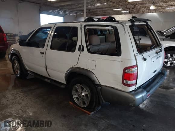 2001 Nissan Pathfinder LE with VIN JN8DR09X41W563935, listed as a IAAI auction lot 41367396 with 287,475 mi miles and . Bid and sale history available at DreamBid. Image 3.