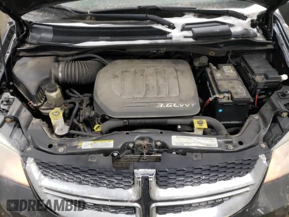 2011 Dodge Caravan with VIN 2D4JN1AG8BR722478, listed as a Copart auction lot 89121995 with 147,995 mi miles and Salvage title. Bid and sale history available at DreamBid. Image 11.