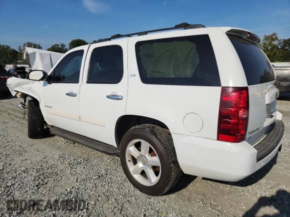 2008 Chevrolet Tahoe LTZ с VIN 1GNFC13078R163293, выставлен на аукционе Copart как лот 80201545 с пробегом 228 289 миль миль и Списание • Salvage title. История ставок и продаж доступна на DreamBid. Изображение 2.