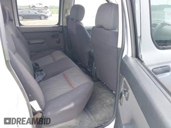 2003 Nissan Frontier SVE with VIN 1N6MD29Y93C428675, listed as a IAAI auction lot 42267402 with 110,881 mi miles and . Bid and sale history available at DreamBid. Image 8.