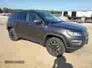 2019 Jeep Compass Trailhawk with VIN 3C4NJDDB2KT713400, listed as a Copart auction lot 84782185 with 63,337 mi miles and Salvage title. Bid and sale history available at DreamBid. Image 4.