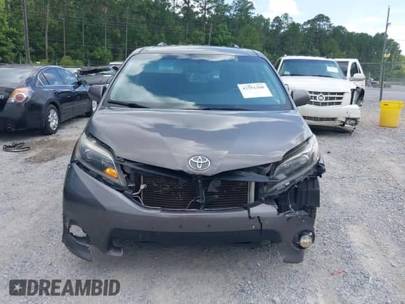 2015 Toyota Sienna SE with VIN 5TDXK3DC9FS598741, listed as a IAAI auction lot 42351368 with 150,054 mi miles and . Bid and sale history available at DreamBid. Image 12.