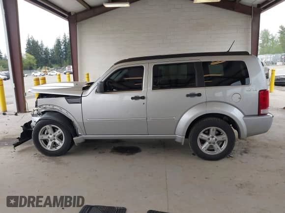 2011 Dodge Nitro SXT z VIN 1D4PU5GK8BW579099, wystawiony jako IAAI lot #42141424 z przebiegiem 92 726 mil mil oraz . Historia ofert i sprzedaży dostępna na DreamBid. Obrazek 14.