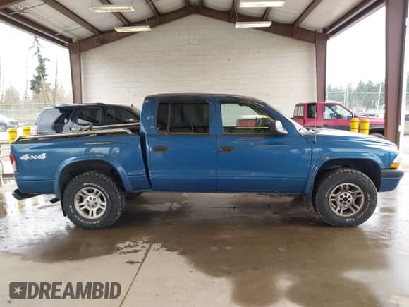 2003 Dodge Dakota Sport with VIN 1D7HG38N63S190756, listed as a IAAI auction lot 41862534 with 177,767 mi miles and . Bid and sale history available at DreamBid. Image 13.