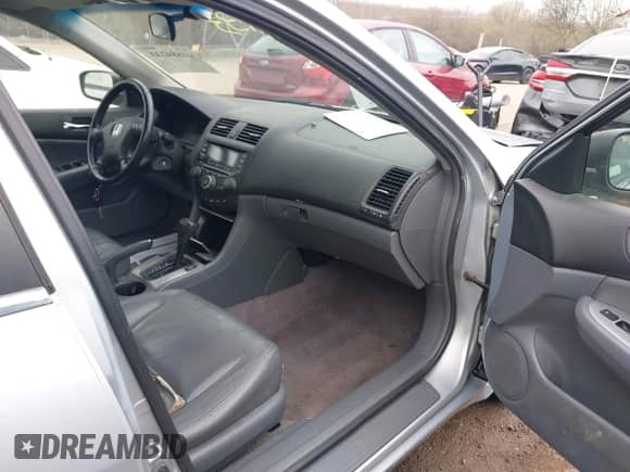 2005 Honda Accord with VIN JHMCN36405C004726, listed as a IAAI auction lot 41884233 with 304,533 mi miles and . Bid and sale history available at DreamBid. Image 5.