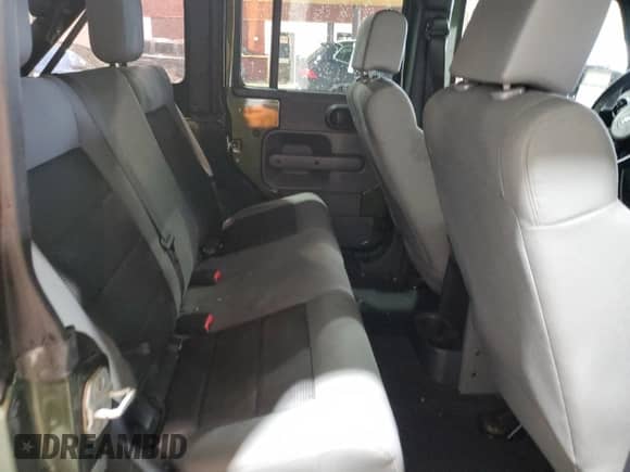 2008 Jeep Wrangler Unlimited X with VIN 1J4GA39158L583789, listed as a Copart auction lot 86292065 with 170,334 mi miles and Salvage title. Bid and sale history available at DreamBid. Image 11.