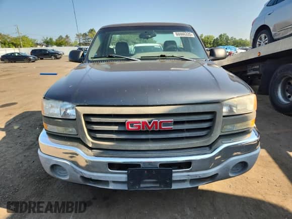 2005 GMC Sierra 1500 Work Truck with VIN 1GTEC14V65Z239340, listed as a Copart auction lot 66666335 with 198,638 mi miles and Clean title. Bid and sale history available at DreamBid. Image 5.