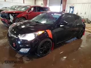 2012 Hyundai Veloster w/Gray Int z VIN KMHTC6AD3CU052773, wystawiony jako Copart lot #70096015 z przebiegiem 154 233 mil mil oraz Czysty tytuł • Clean title. Historia ofert i sprzedaży dostępna na DreamBid. Obrazek 1.
