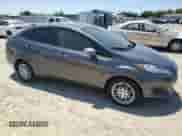 2015 Ford Fiesta SE z VIN 3FADP4BE6FM159131, wystawiony jako Copart lot #62499295 z przebiegiem Nie podano mil oraz Szkoda całkowita • Salvage title. Historia ofert i sprzedaży dostępna na DreamBid. Obrazek 4.