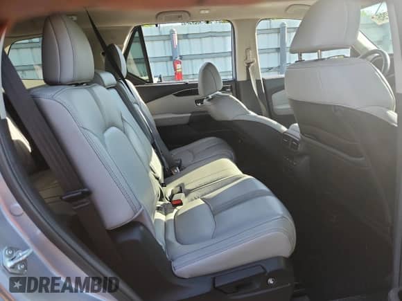 2025 Honda Pilot Touring с VIN 5FNYG2H75SB013004, выставлен на аукционе Copart как лот 61755295 с пробегом 47 661 миль миль и Списание • Salvage title. История ставок и продаж доступна на DreamBid. Изображение 10.