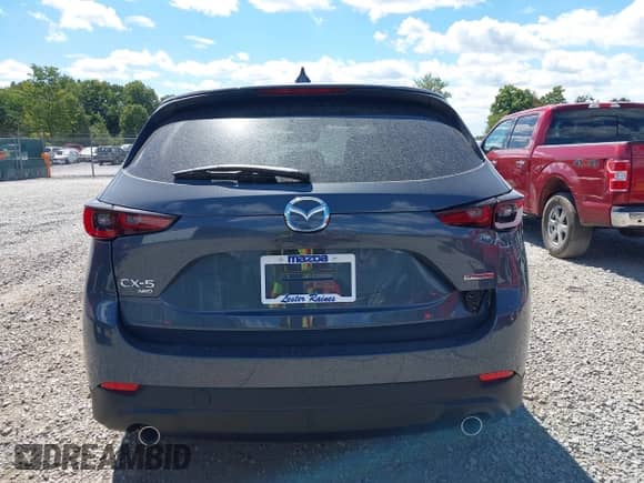 2025 Mazda CX-5 S Carbon Edition z VIN JM3KFBCM9S0704712, wystawiony jako IAAI lot #43104311 z przebiegiem 3 mil mil oraz . Historia ofert i sprzedaży dostępna na DreamBid. Obrazek 16.