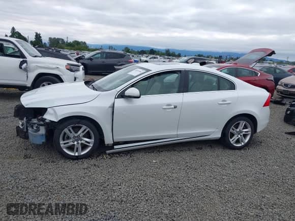 2015 Volvo S60 T5 Drive-E Premier with VIN YV140MFK2F2339819, listed as a IAAI auction lot 42651504 with 127,550 mi miles and . Bid and sale history available at DreamBid. Image 15.