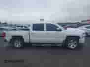 2017 Chevrolet Silverado 1500 LT z VIN 3GCUKREC1HG336315, wystawiony jako IAAI lot #42128262 z przebiegiem 196 516 mil mil oraz . Historia ofert i sprzedaży dostępna na DreamBid. Obrazek 13.