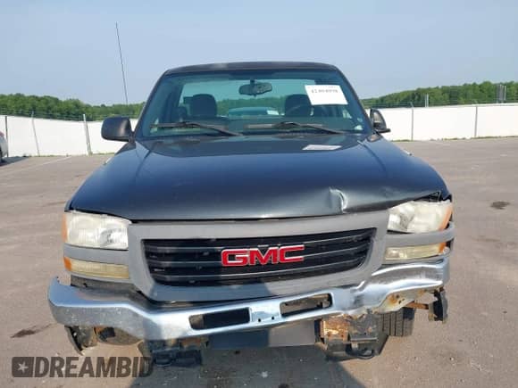 2005 GMC Sierra 1500 Work Truck z VIN 1GTEC14X05Z190508, wystawiony jako IAAI lot #42404098 z przebiegiem 169 043 mil mil oraz . Historia ofert i sprzedaży dostępna na DreamBid. Obrazek 12.