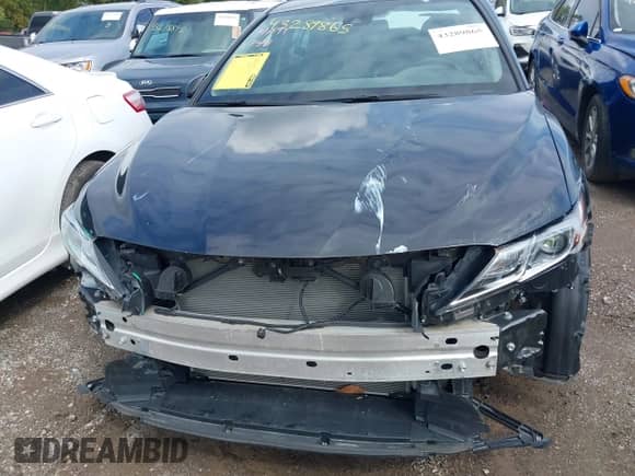 2023 Toyota Camry LE z VIN 4T1R11AK7PU130043, wystawiony jako IAAI lot #43289865 z przebiegiem 24 472 mil mil oraz . Historia ofert i sprzedaży dostępna na DreamBid. Obrazek 13.