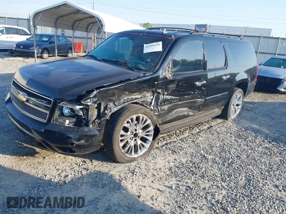 2007 Chevrolet Suburban LT with VIN 3GNFC16077G153129, listed as a IAAI auction lot 42059118 with 280,604 mi miles and . Bid and sale history available at DreamBid. Image 17.