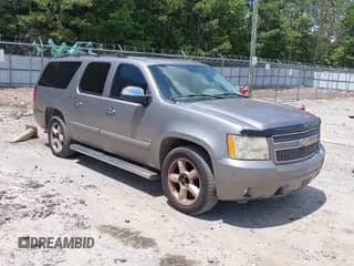 2007 Chevrolet Suburban LT z VIN 3GNFC16007G175621, wystawiony jako IAAI lot #42847597 z przebiegiem 194 071 mil mil oraz . Historia ofert i sprzedaży dostępna na DreamBid. Obrazek 1.