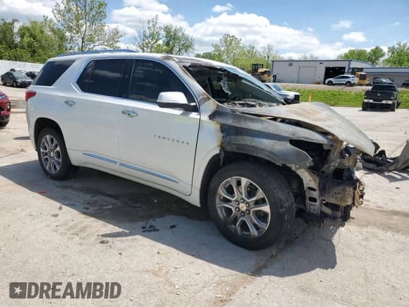 2021 Chevrolet Traverse Premier с VIN 1GNEVKKW2MJ138490, выставлен на аукционе Copart как лот 55822675 с пробегом Не указан миль и Списание • Salvage title. История ставок и продаж доступна на DreamBid. Изображение 4.