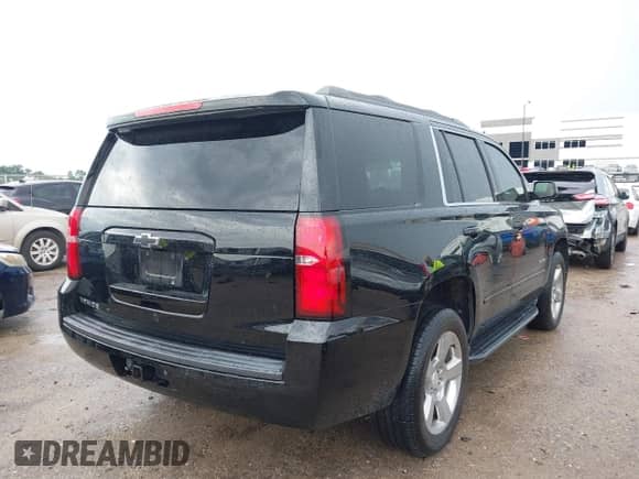 2019 Chevrolet Tahoe LS with VIN 1GNSCAKC4KR198469, listed as a IAAI auction lot 43025899 with 57,053 mi miles and . Bid and sale history available at DreamBid. Image 4.