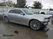 2013 Chrysler 300 S with VIN 2C3CCABG6DH658335, listed as a Copart auction lot 82272815 with 221,697 mi miles and Salvage title. Bid and sale history available at DreamBid. Image 4.