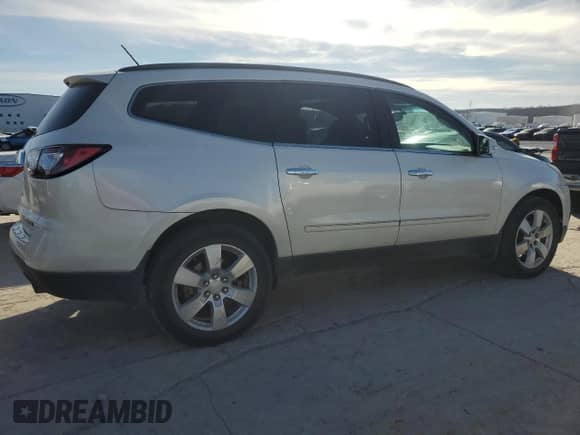 2013 Chevrolet Traverse LTZ z VIN 1GNKVLKD3DJ219344, wystawiony jako Copart lot #87460664 z przebiegiem 196 117 mil mil oraz Szkoda całkowita • Salvage title. Historia ofert i sprzedaży dostępna na DreamBid. Obrazek 3.
