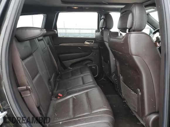 2014 Jeep Grand Cherokee Summit с VIN 1C4RJFJM5EC340730, выставлен на аукционе Copart как лот 84893134 с пробегом 143 196 миль миль и Списание • Salvage title. История ставок и продаж доступна на DreamBid. Изображение 11.