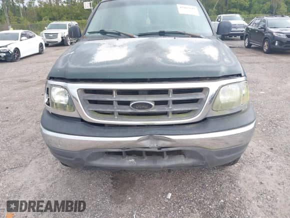 2002 Ford F-150 XL z VIN 1FTRF18L72NB55841, wystawiony jako IAAI lot #43467617 z przebiegiem 175 289 mil mil oraz . Historia ofert i sprzedaży dostępna na DreamBid. Obrazek 6.