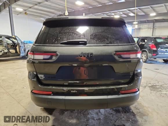2023 Jeep Grand Cherokee Limited with VIN 1C4RJKBG8P8709880, listed as a Copart auction lot 70421855 with 36,993 mi miles and Salvage title. Bid and sale history available at DreamBid. Image 6.