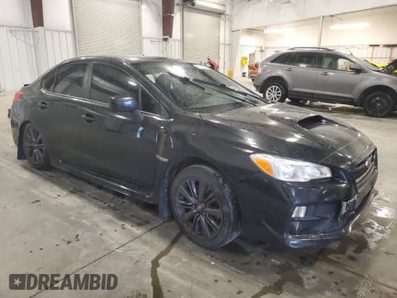 2015 Subaru WRX with VIN JF1VA1A62F9828475, listed as a Copart auction lot 64818785 with 145,553 mi miles and Salvage title. Bid and sale history available at DreamBid. Image 4.
