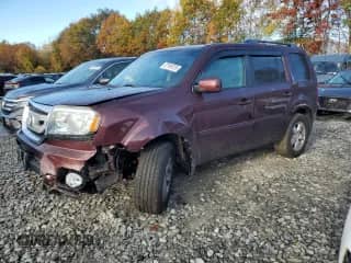 2011 Honda Pilot EX z VIN 5FNYF4H4XBB013312, wystawiony jako Copart lot #87199725 z przebiegiem 153 974 mil mil oraz Czysty tytuł • Clean title. Historia ofert i sprzedaży dostępna na DreamBid. Obrazek 1.