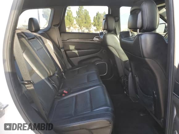 2015 Jeep Grand Cherokee High Altitude with VIN 1C4RJECG1FC231961, listed as a Copart auction lot 82002425 with 122,290 mi miles and Salvage title. Bid and sale history available at DreamBid. Image 11.