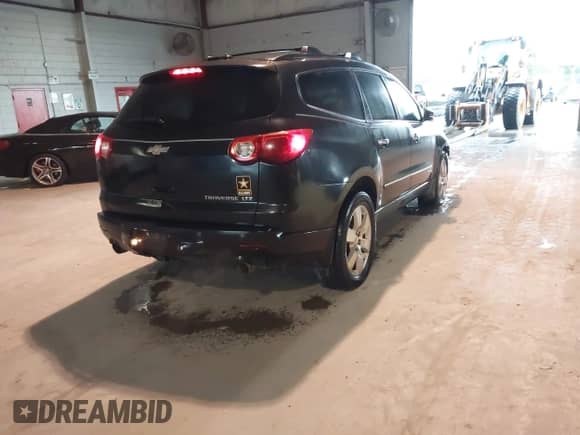 2011 Chevrolet Traverse LTZ с VIN 1GNKRLEDXBJ373272, выставлен на аукционе IAAI как лот 42397113 с пробегом Не указан миль и . История ставок и продаж доступна на DreamBid. Изображение 4.