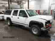 1993 Chevrolet Suburban z VIN 1GNFK16K1PJ330504, wystawiony jako IAAI lot #42194701 z przebiegiem 215 656 mil mil oraz . Historia ofert i sprzedaży dostępna na DreamBid. Obrazek 1.